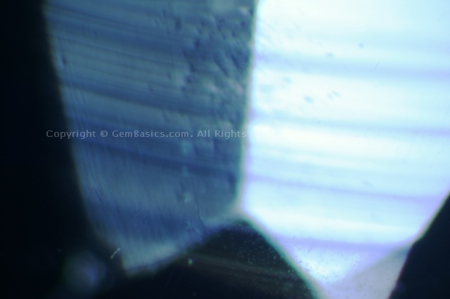 Curved striae in Verneuil synthetic sapphire